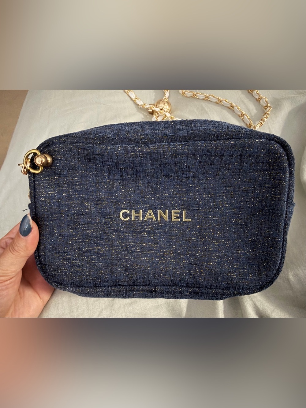 Authentic Chanel Beaute denim cosmetic pouch with white/gold standard chain